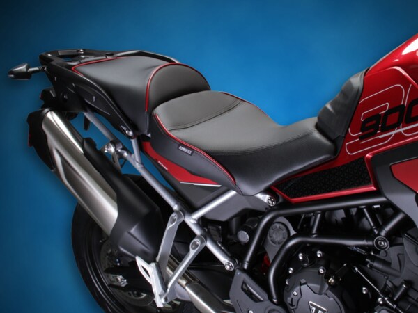 World Sport Aftermarket Motorcycle Seats on the Triumph Tiger 900 GT 2024+ shown with DTX and Gripzones with Carnival Red accentsCFX afor WS-781-SE9.